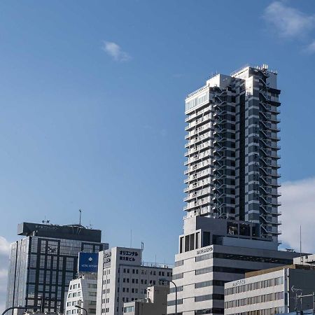 Hotel Wbf Shin-Osaka Skytower Екстериор снимка