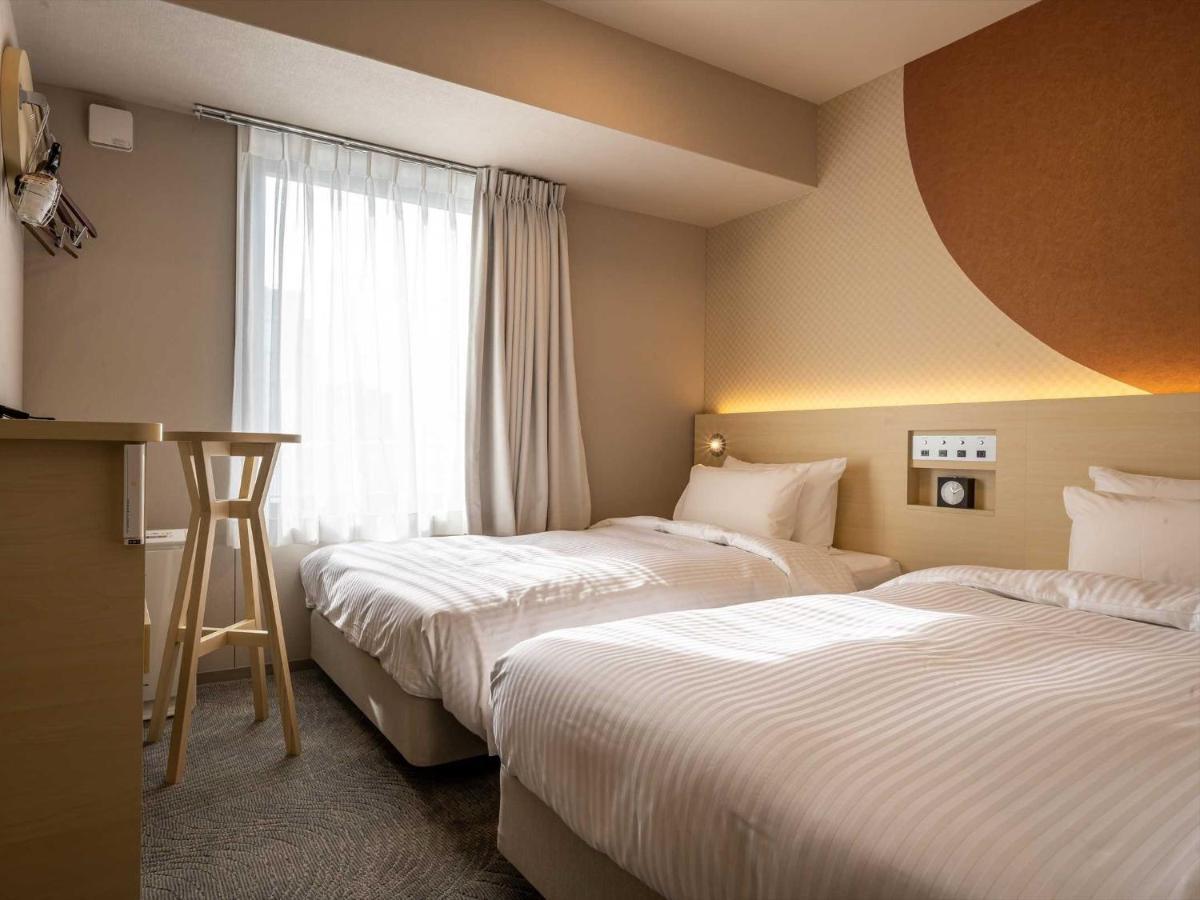 Hotel Wbf Shin-Osaka Skytower Екстериор снимка